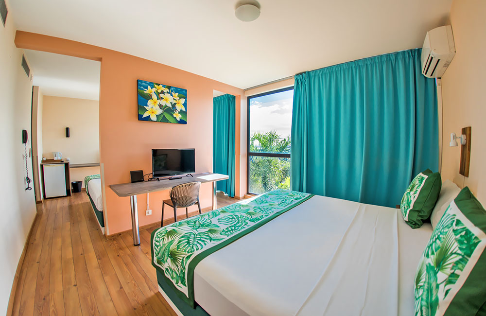 Tahiti Airport Hotel Chambre familiale climatisée Tahiti Airport Hotel Chambre familiale climatisée