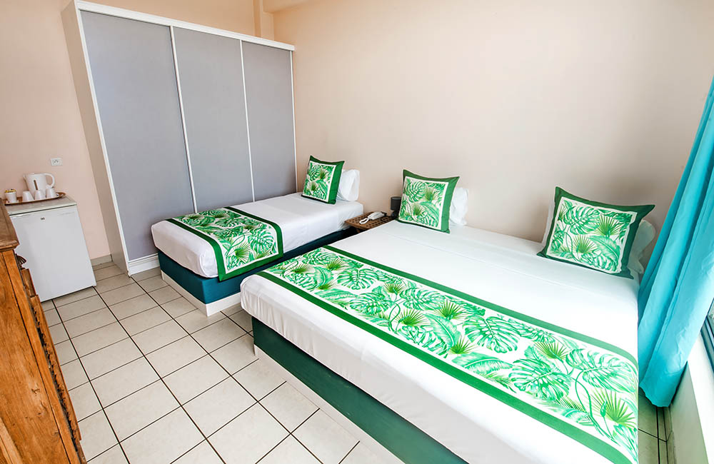 Tahiti Airport Hotel Chambre climatisée adpatée aux personnes à mobilité réduite Tahiti Airport Hotel Chambre climatisée adaptée aux PMR